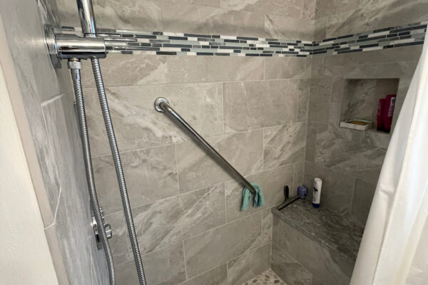 Walls- Alabama Perla Accent- Bliss Waterfalls Linear Shower Floor- Harmony Warm Round Pebbles